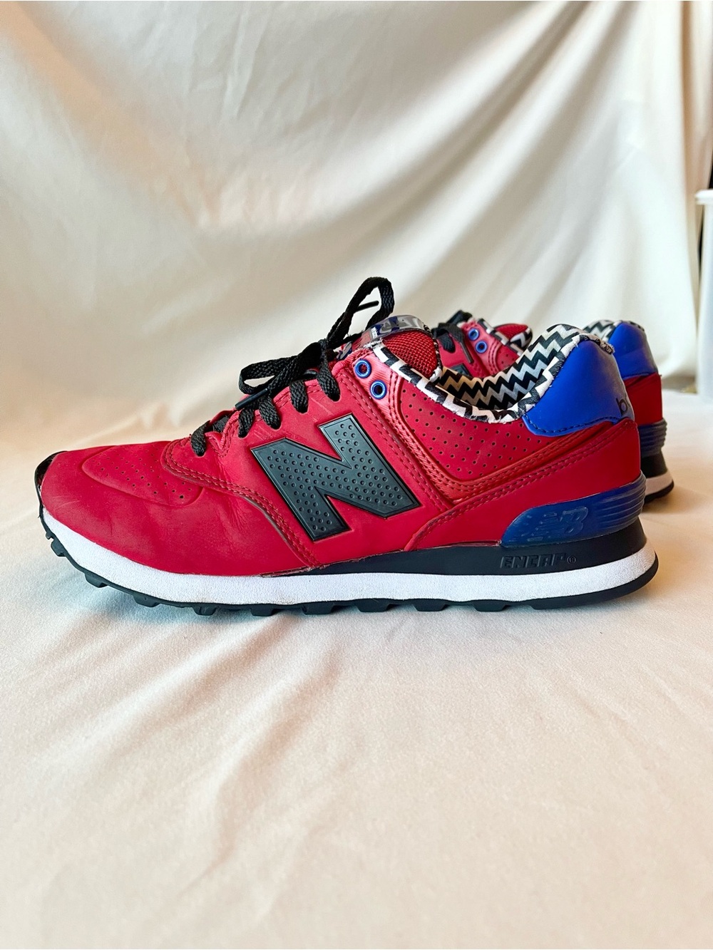 New Balance Women’s 574 Red Paint Chip Sneakers with Blue and Chevron Accent